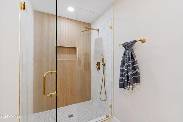 bathroom with an enclosed shower