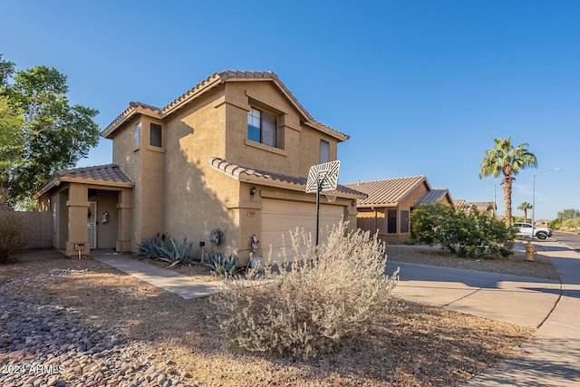 view of front of home with a garage