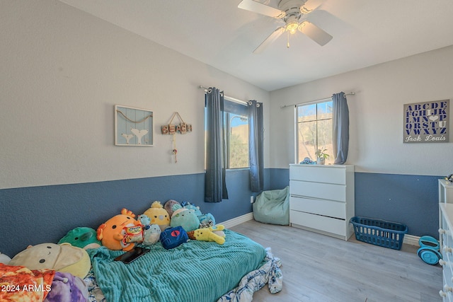 bedroom featuring ceiling fan and light wood-type flooring