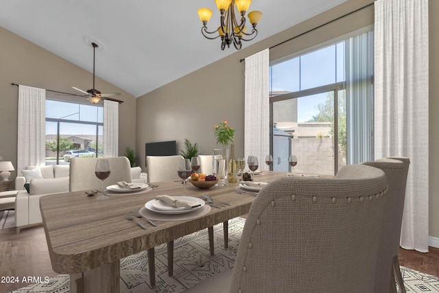 dining area featuring high vaulted ceiling, hardwood / wood-style floors, and a chandelier