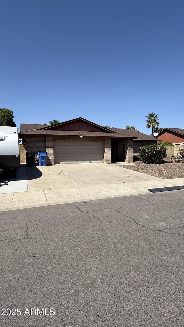16638 N 46th Ln, Glendale, AZ 85306 - single story home featuring brick siding, driveway, and an attached garage