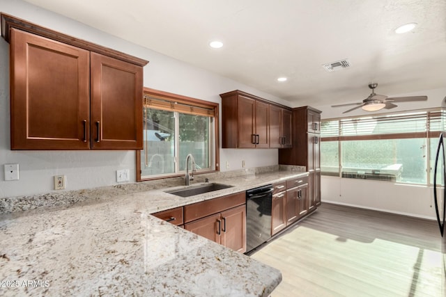 16638 N 46th Ln, Glendale, AZ 85306 - kitchen featuring ceiling fan, light wood-style flooring, visible vents, black dishwasher, and a sink