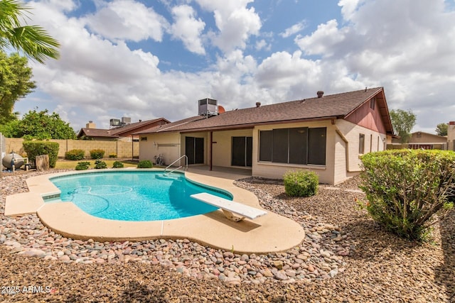 16638 N 46th Ln, Glendale, AZ 85306 - view of swimming pool featuring a fenced in pool, a patio, a diving board, cooling unit, and a fenced backyard