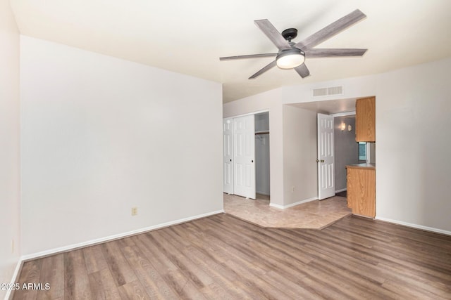 16638 N 46th Ln, Glendale, AZ 85306 - interior space with visible vents, baseboards, a ceiling fan, and wood finished floors