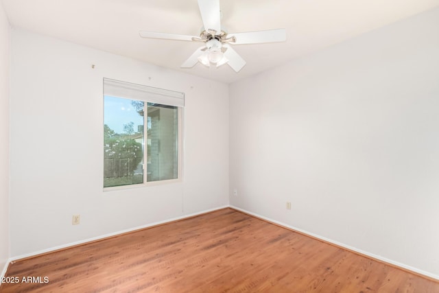 16638 N 46th Ln, Glendale, AZ 85306 - empty room featuring baseboards, a ceiling fan, and wood finished floors