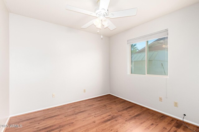 16638 N 46th Ln, Glendale, AZ 85306 - empty room featuring baseboards, ceiling fan, and wood finished floors