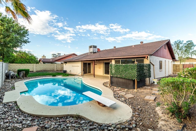 16638 N 46th Ln, Glendale, AZ 85306 - view of swimming pool featuring a patio area, a fenced backyard, a fenced in pool, and a diving board