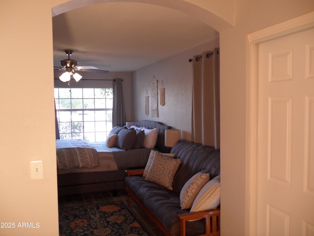 1333 N Higley Rd Unit 7, Mesa, AZ 85205 - bedroom featuring arched walkways and wood finished floors