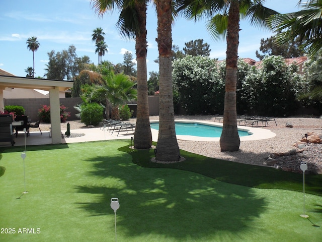 1333 N Higley Rd Unit 7, Mesa, AZ 85205 - view of pool featuring a putting green and a patio