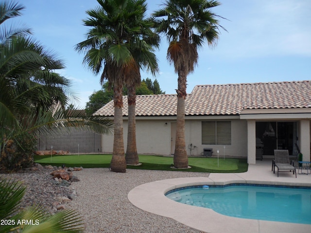 1333 N Higley Rd Unit 7, Mesa, AZ 85205 - outdoor pool with a putting green, a patio, and central AC