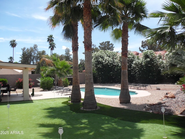 1333 N Higley Rd Unit 7, Mesa, AZ 85205 - outdoor pool featuring an area to practice putting and a patio