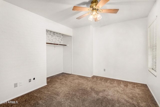 unfurnished bedroom featuring a ceiling fan, carpet, baseboards, and a closet