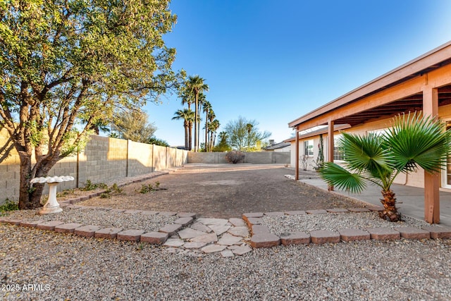 view of yard with a fenced backyard