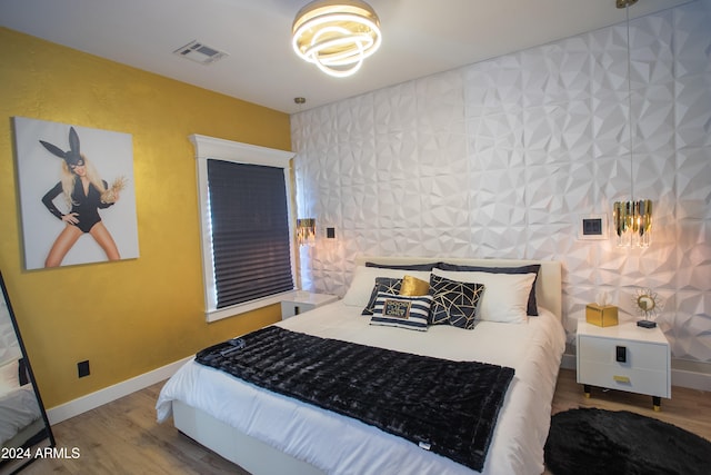 bedroom featuring hardwood / wood-style flooring