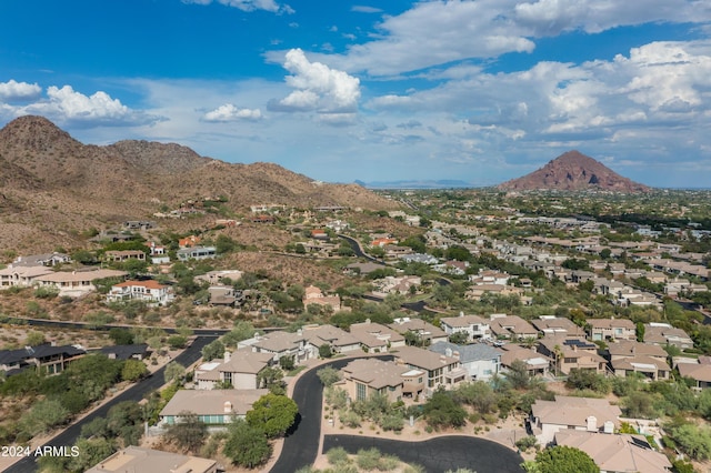 birds eye view of property featuring a mountain view