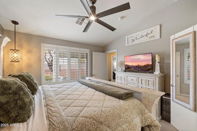 bedroom with vaulted ceiling and a ceiling fan