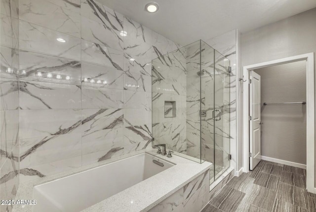 815 E Rose Ln Unit 105, Phoenix, AZ 85014 - full bath featuring a marble finish shower, a tub with marble appearance, baseboards, and recessed lighting
