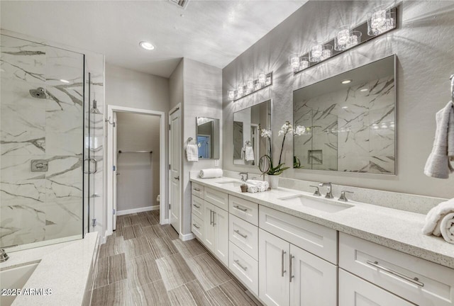 815 E Rose Ln Unit 105, Phoenix, AZ 85014 - full bath with toilet, double vanity, a marble finish shower, and a sink
