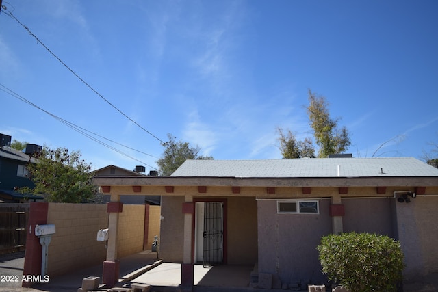 rear view of house with a patio area