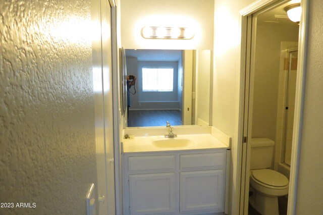 2301 E University Dr Unit 334, Mesa, AZ 85213 - bathroom featuring vanity and toilet