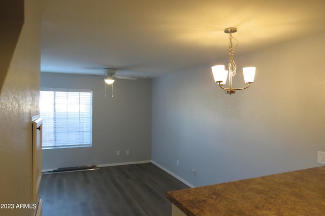 2301 E University Dr Unit 334, Mesa, AZ 85213 - spare room with dark wood-style floors, ceiling fan, and a chandelier