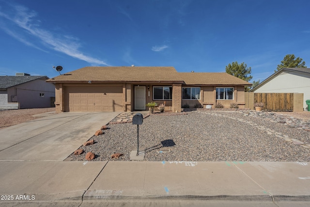 single story home with a garage