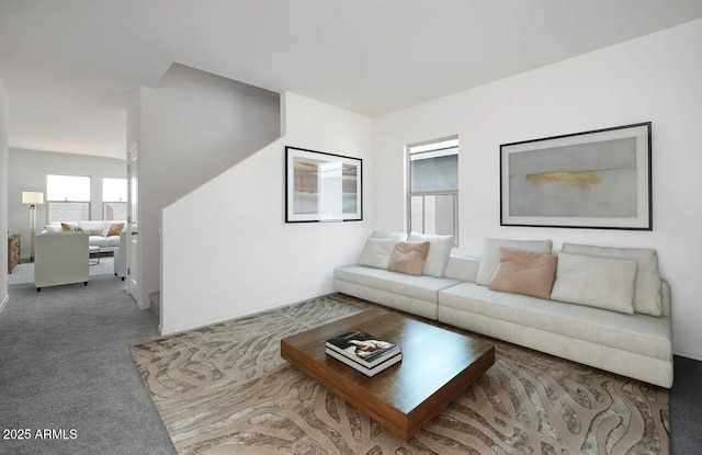 living room with light colored carpet and lofted ceiling