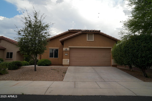 4246 Kings Canyon Way, Sierra Vista, AZ 85650 - view of front of property with driveway, stucco siding, a garage, and a tile roof