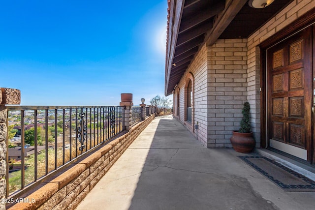 11237 N 15th Ln, Phoenix, AZ 85029 - view of side of property with brick siding, a balcony, and stone siding