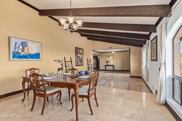 11237 N 15th Ln, Phoenix, AZ 85029 - dining space with a chandelier, baseboards, and arched walkways