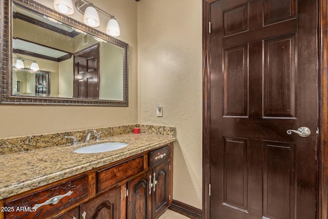 11237 N 15th Ln, Phoenix, AZ 85029 - bathroom featuring a textured wall and vanity
