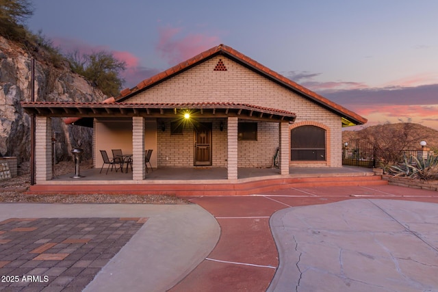 11237 N 15th Ln, Phoenix, AZ 85029 - rear view of house with a tiled roof and a patio