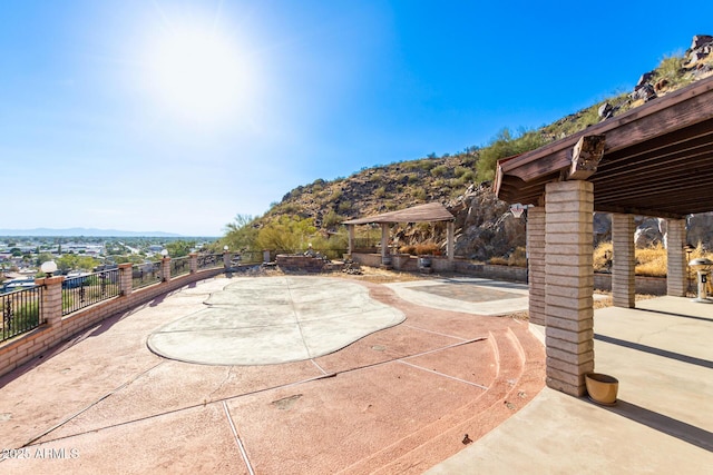 11237 N 15th Ln, Phoenix, AZ 85029 - view of patio / terrace with a gazebo, a mountain view, and fence