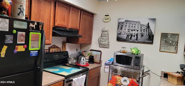 kitchen featuring black appliances