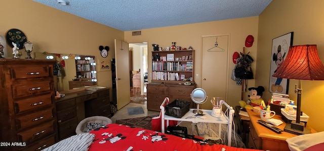 dining area featuring carpet and a textured ceiling