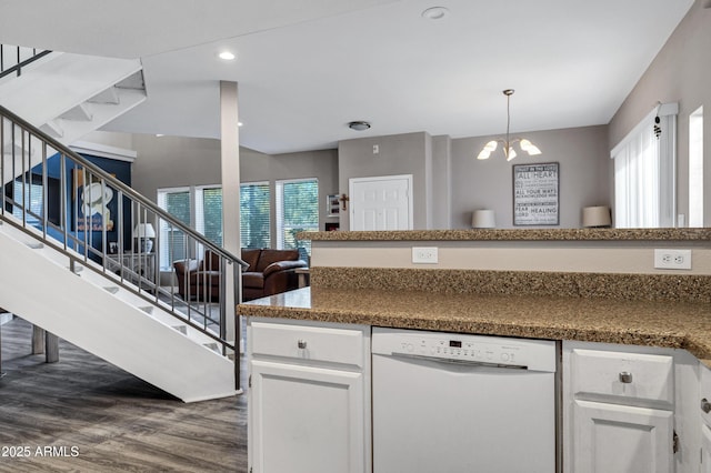 kitchen featuring a notable chandelier, dark wood finished floors, white cabinets, and dishwasher