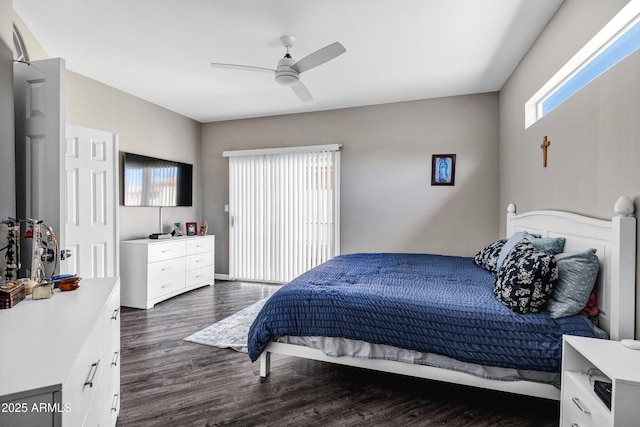 bedroom featuring dark wood finished floors and ceiling fan