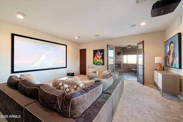 cinema room featuring recessed lighting and light colored carpet