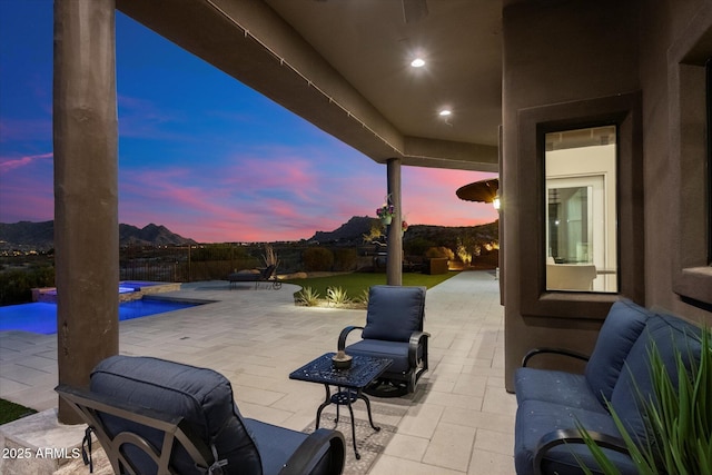 view of patio with an outdoor pool