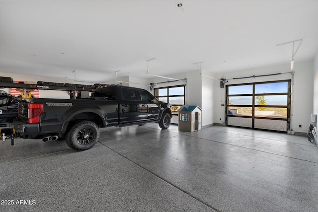 garage featuring baseboards