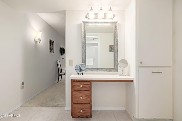 bathroom featuring tile patterned floors and vanity