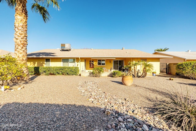 ranch-style house with central AC