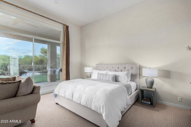 bedroom with access to exterior, baseboards, and carpet
