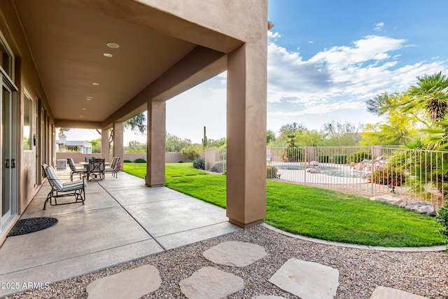 view of patio with a fenced backyard