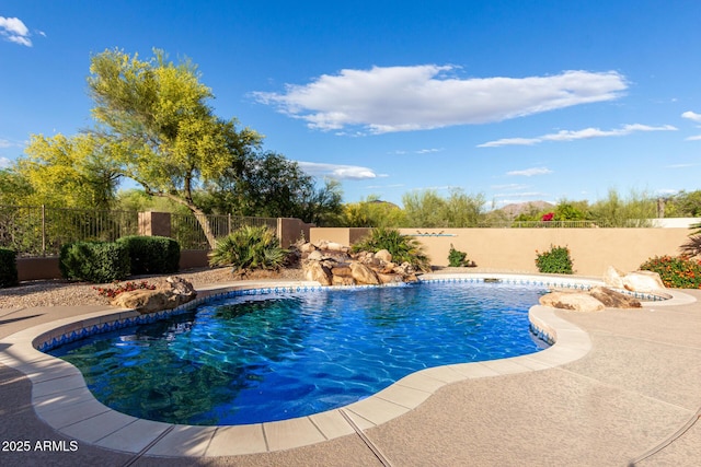 view of pool with a fenced in pool and a fenced backyard