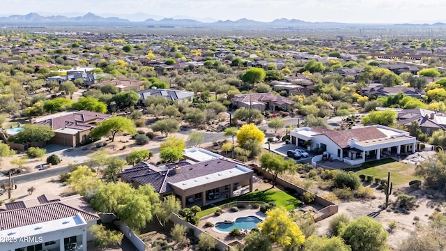 drone / aerial view featuring a mountain view and a residential view