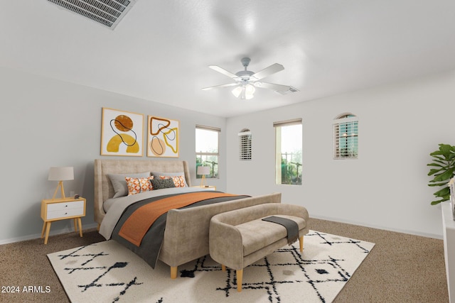 bedroom with ceiling fan and carpet floors