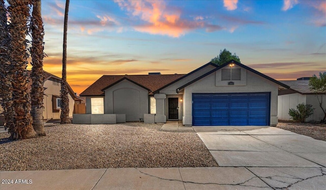 ranch-style house with a garage