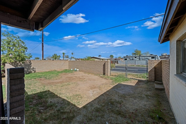 view of yard featuring a fenced backyard