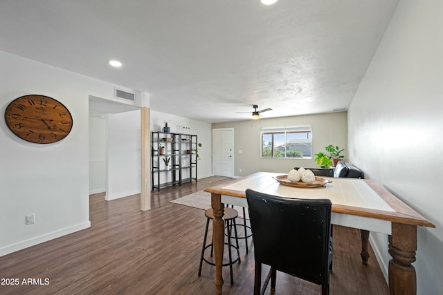 dining room featuring ceiling fan, recessed lighting, wood finished floors, visible vents, and baseboards